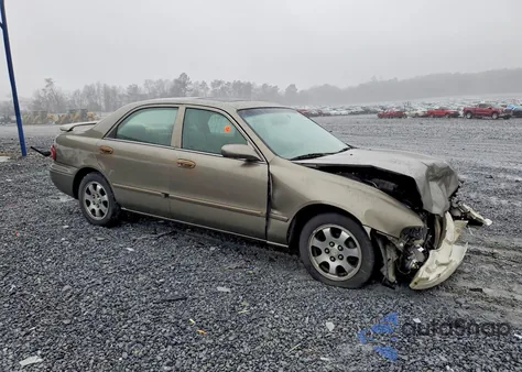 2001 Mazda 626 Es z USA, uszkodzony, nr VIN 1YVGF22C815237138